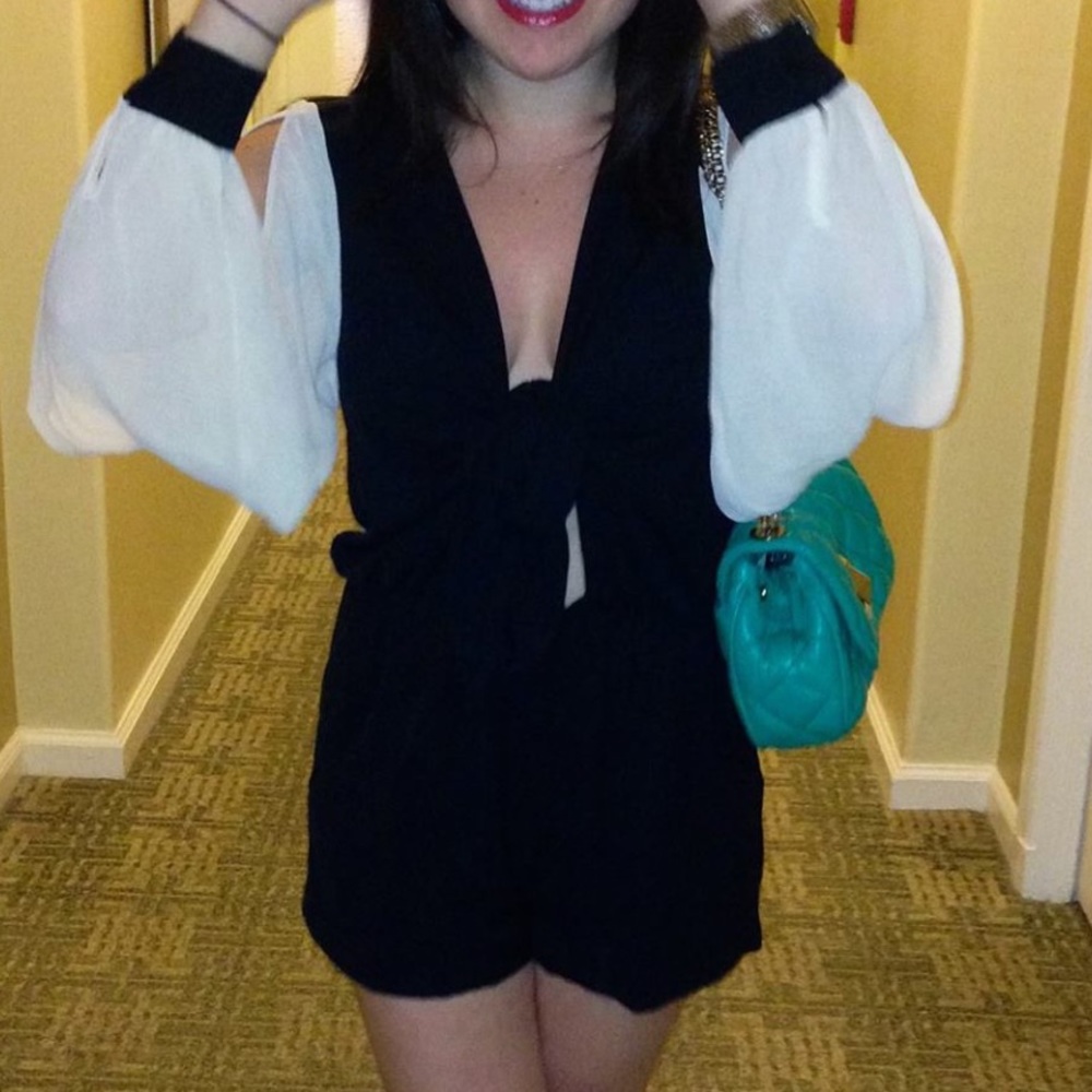 Super cute romper. Black with beige open sleeves